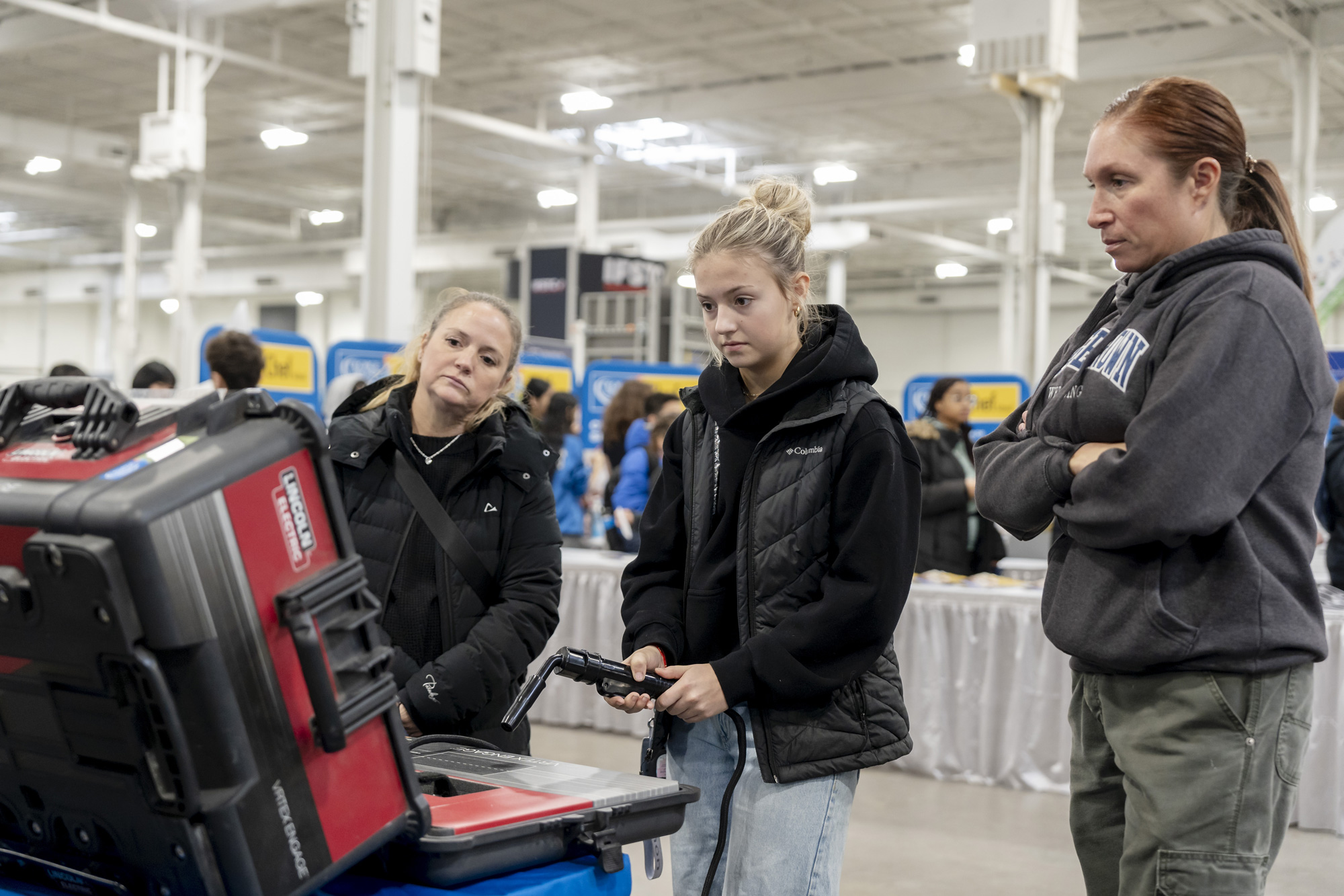 Young women try out virtual welding