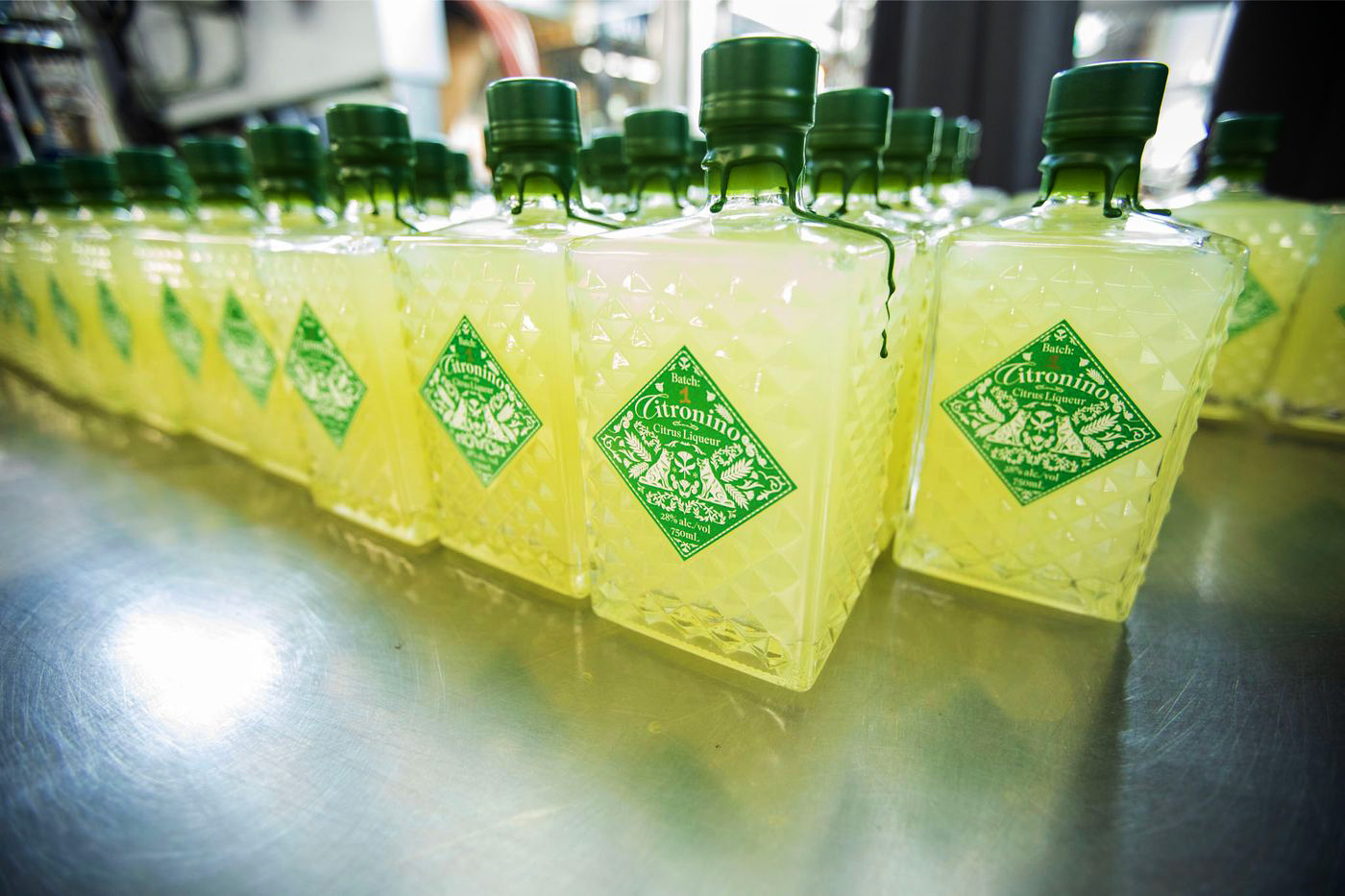 A row of bottles on a countertop