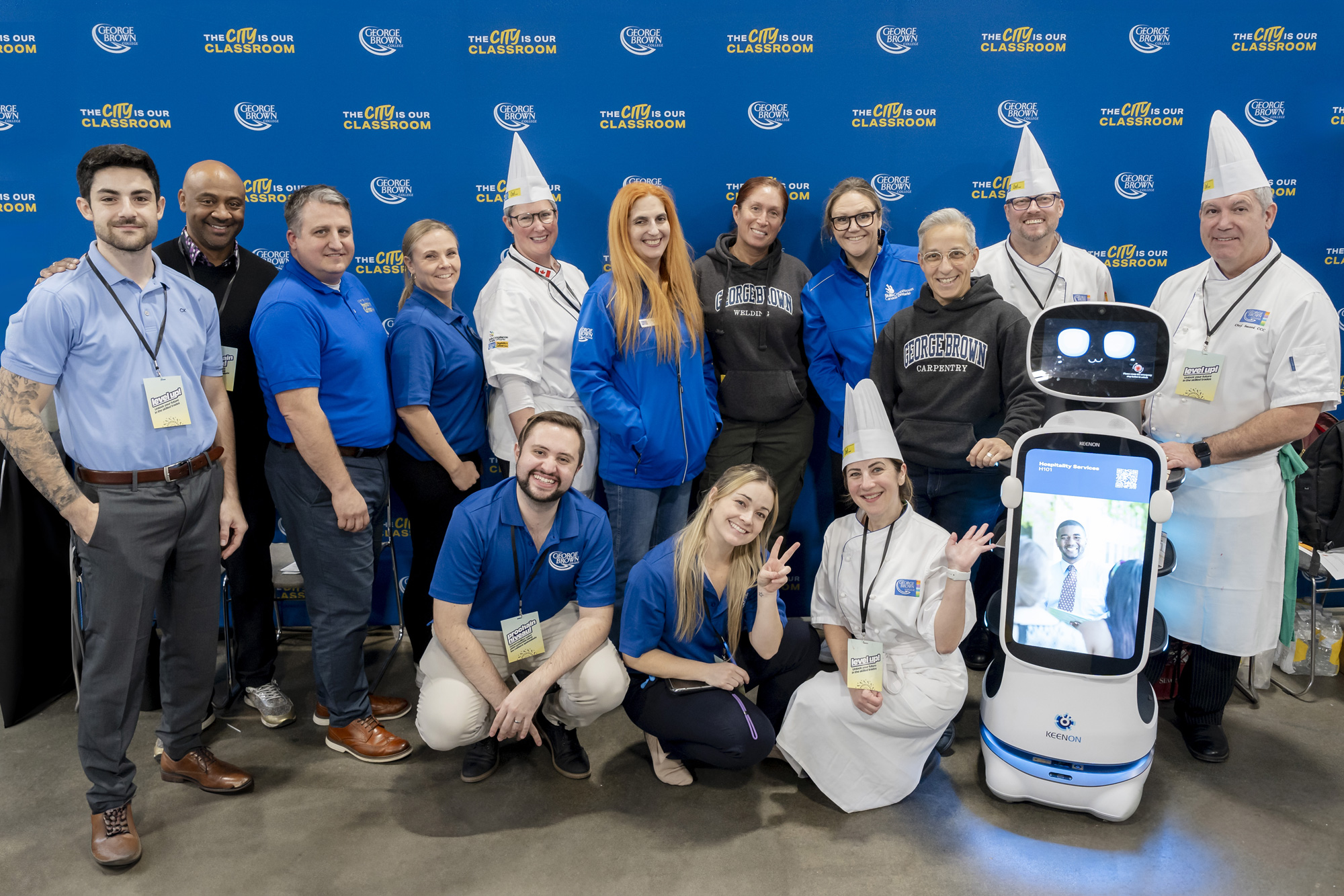 Group of construction and hospitality professionals smiling