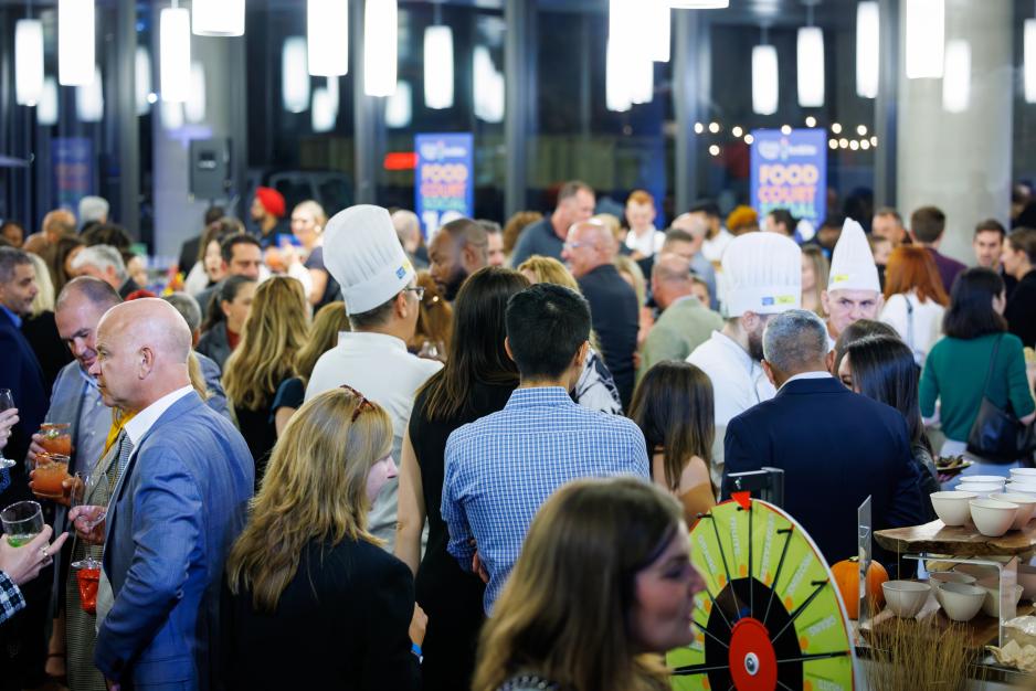 People networking at the Food Court Social 2023 event