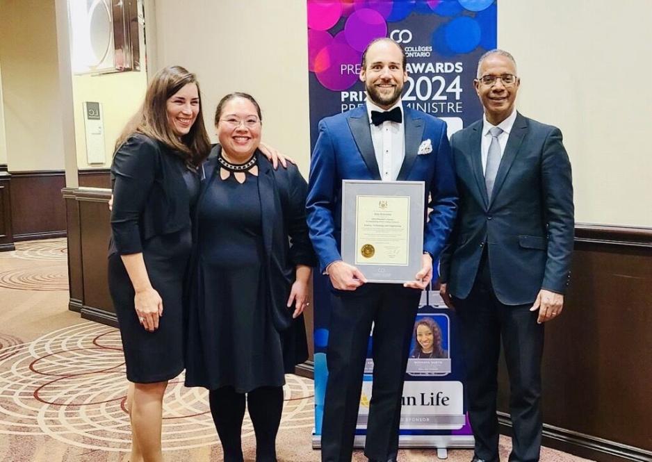 Premier's Award winner Eric Kukucka standing with President Fearon and VP Academic Eileen DeCourcy